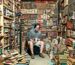 Chuck Robeets, owner of Wonder Book & Video and Books By The Foot, photographed in one of the many rooms conataining vintage leather-bound books at his warehouse in Frederick, MD, September 28, 2020.